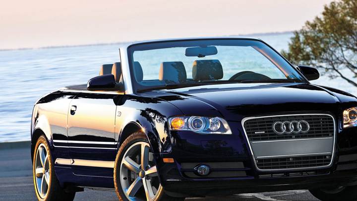 Audi A4 Cabriolet In Shine Black Front Pose Near Sea Side
